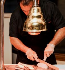 Conducts cooking classes in association